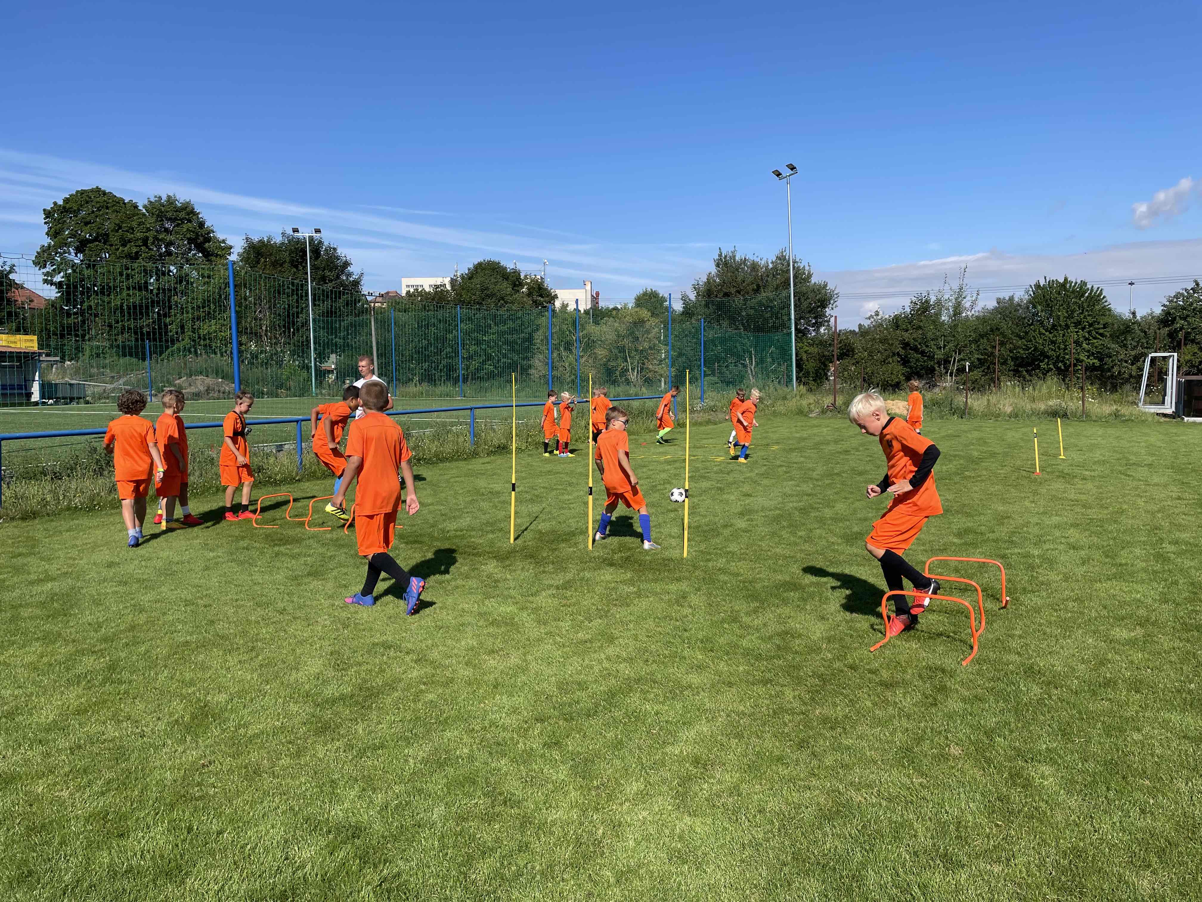 Football Game Centrum - Fotbalisté při západu slunce